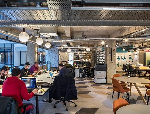 Speakeasy style co-working space by Ben Adams Architects