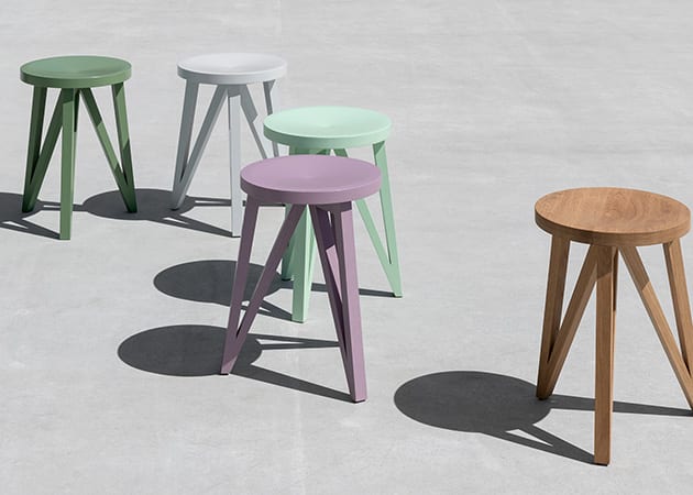 colourful stools on a plain background - onofficemagazine.com