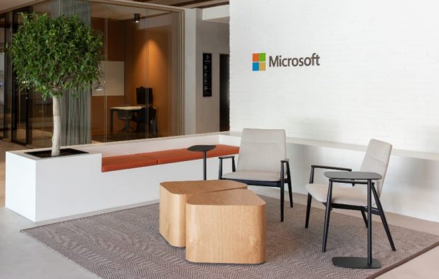 reception area with a microsoft office logo on the wall