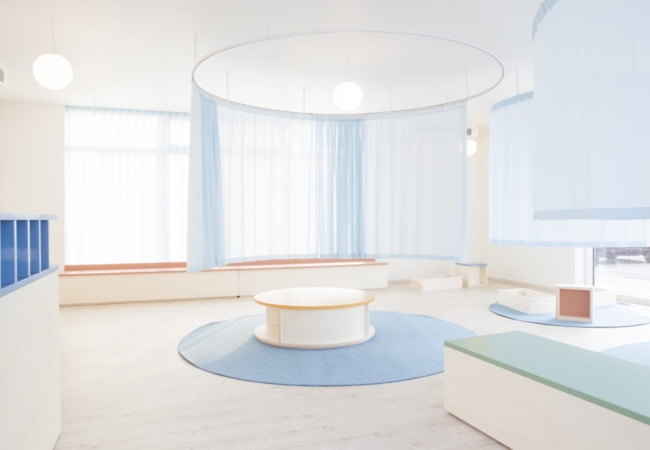 A palette of pastels permeates within this dental clinic