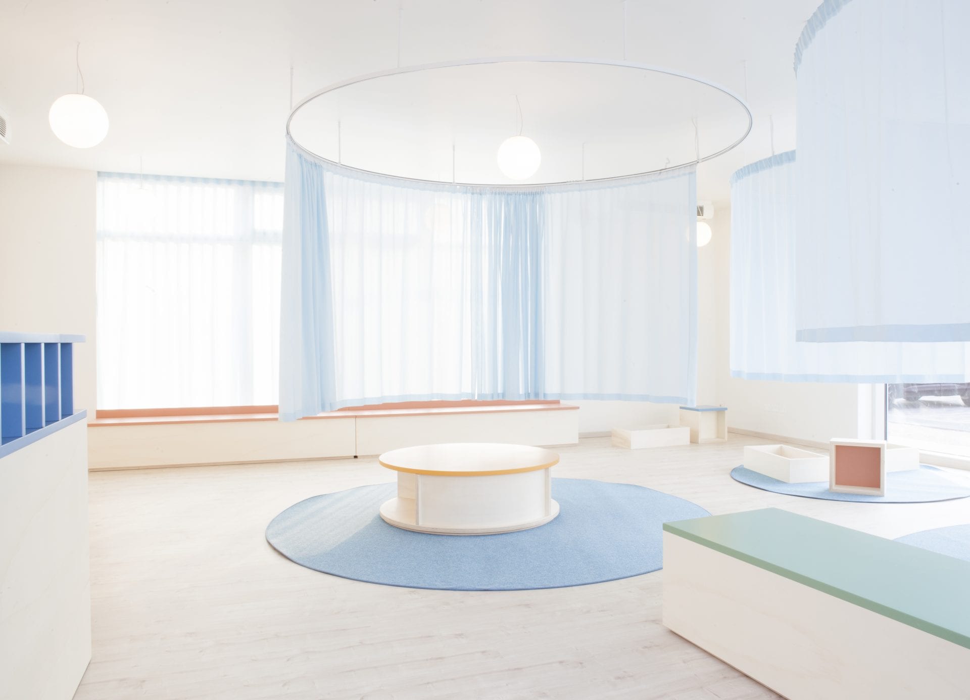 A palette of pastels permeates within this dental clinic