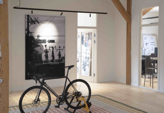OEO designs a lifestyle office – a new HQ & flagship store for Danish cycling brand Pas Normal Studios