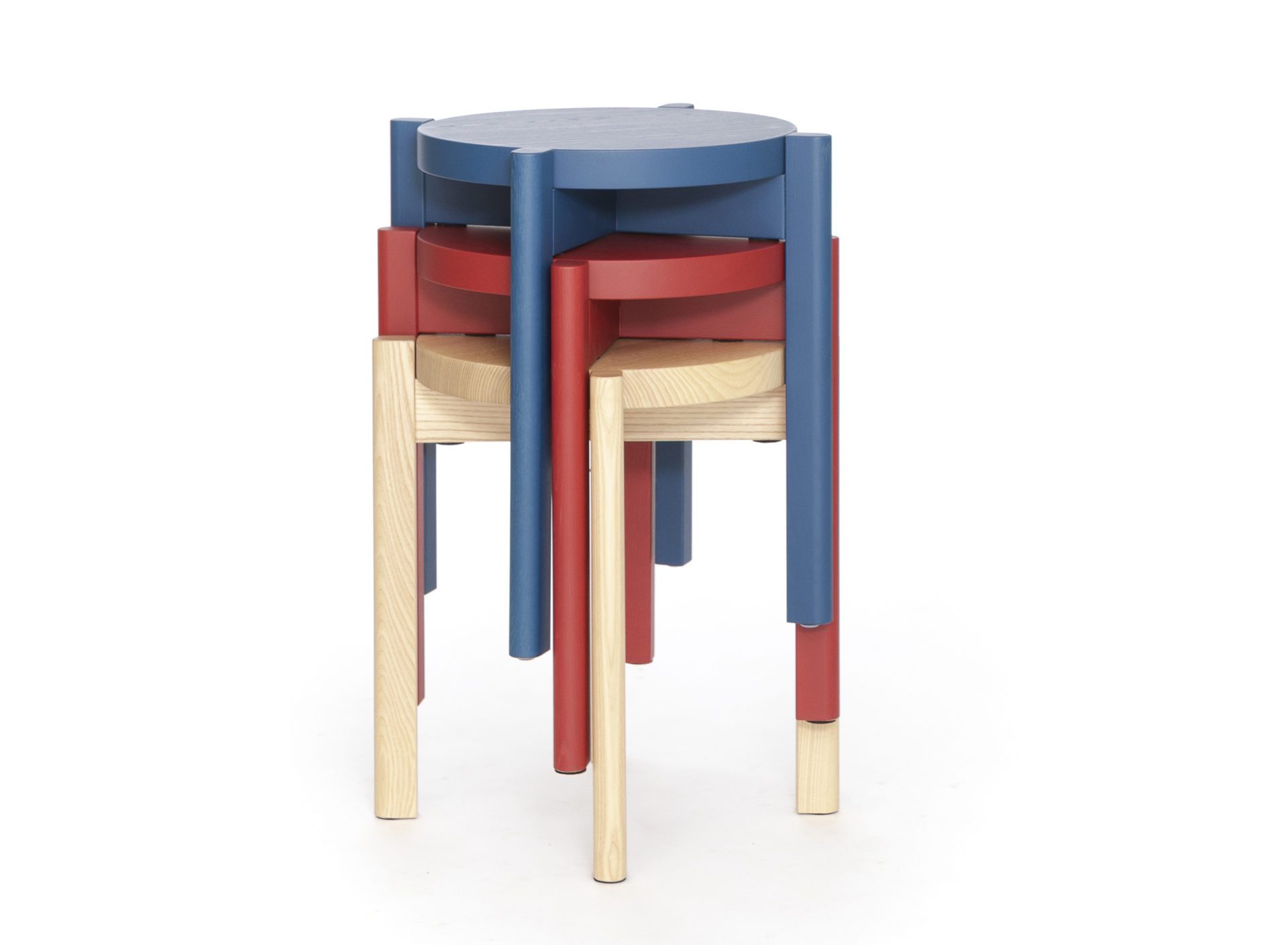 Inno coloured timber stools stacked