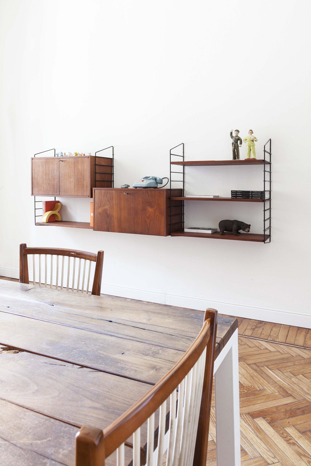 Meeting table with shelving unit
