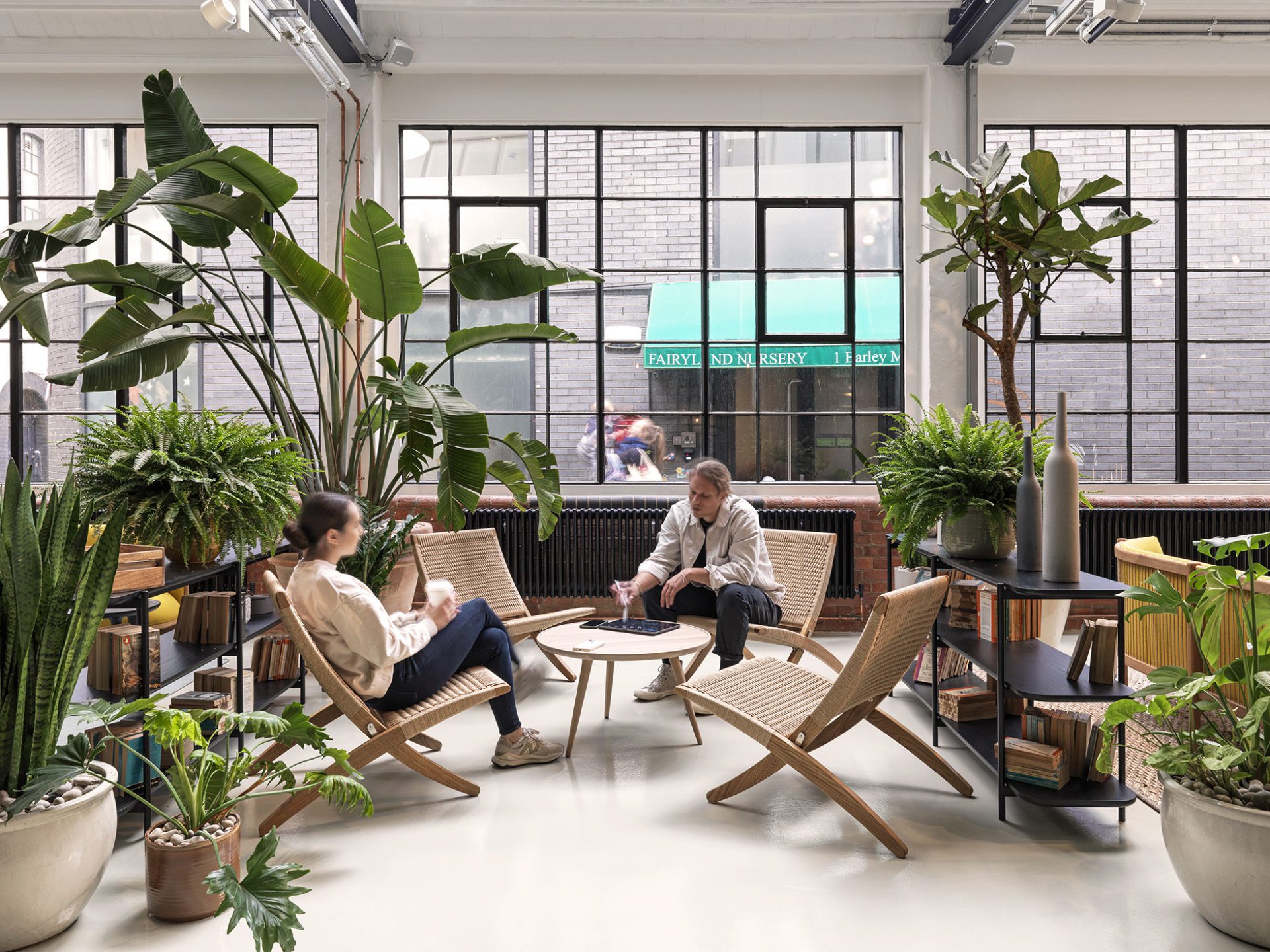 Rattan seating in front of crittall window