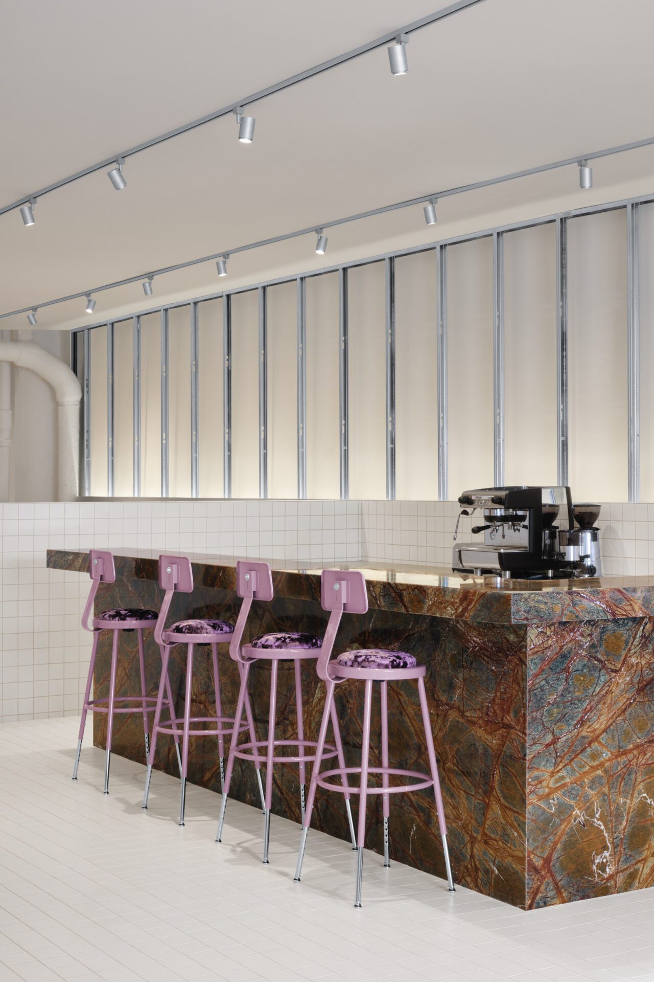 Marble bar with pink stools