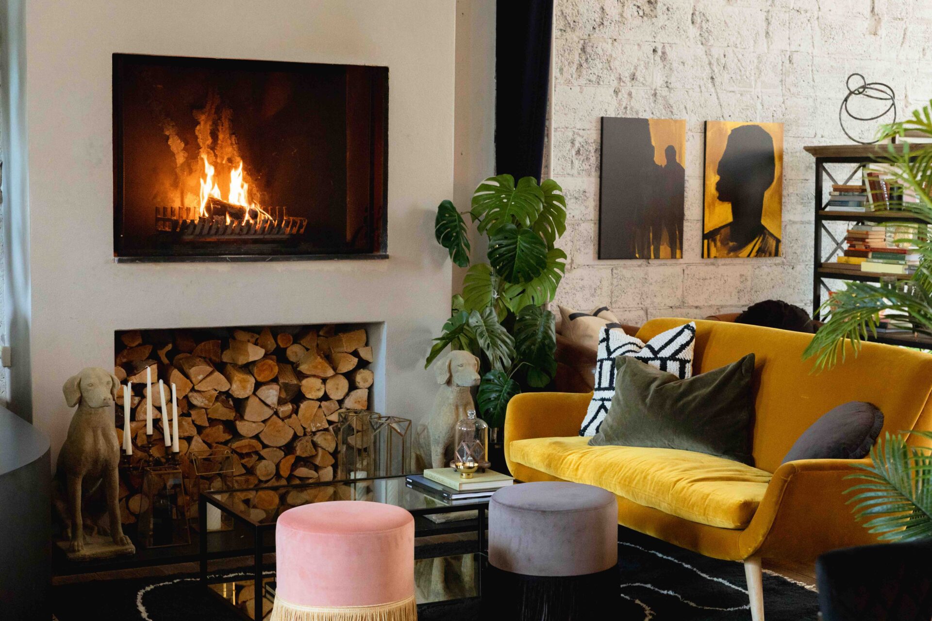 Seating, yellow sofa in front of fireplace