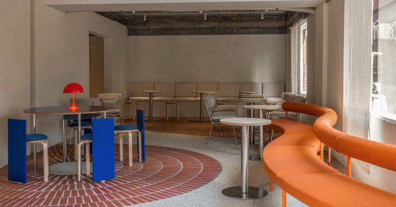 Cafe Norrri South Korea orange bench blue chairs