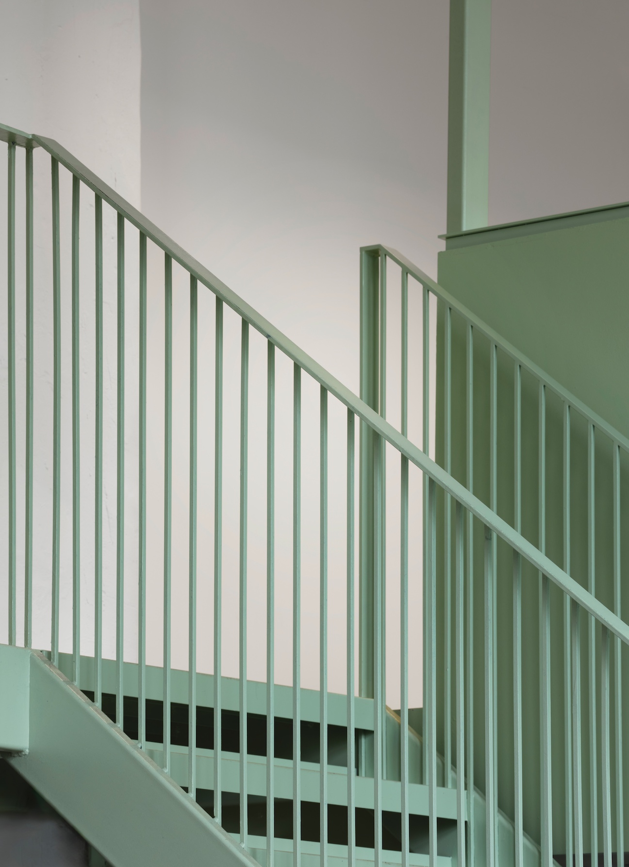 Relaxound office interior pastel green staircase