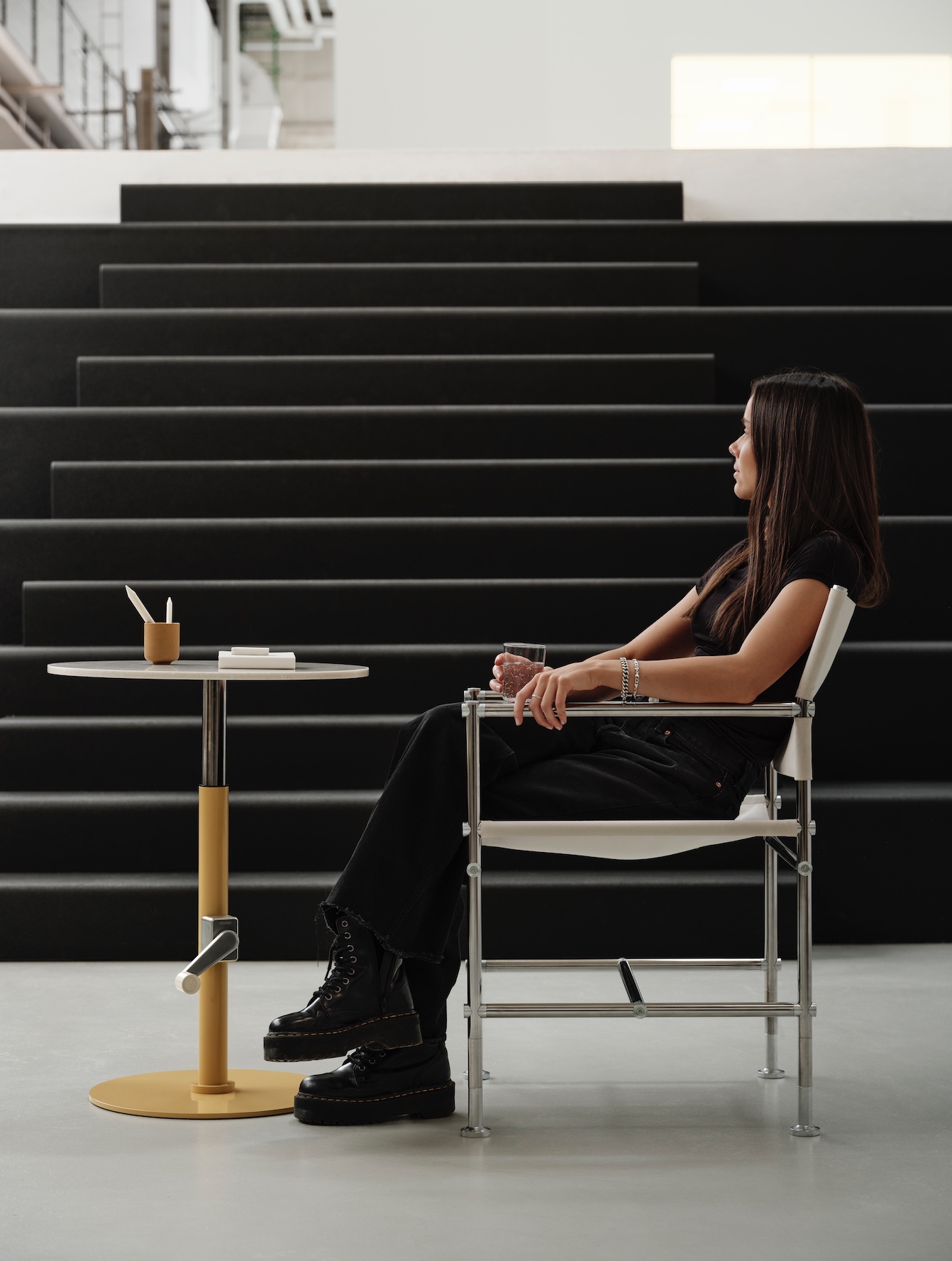 Bla Station Able chair woman sitting on chair