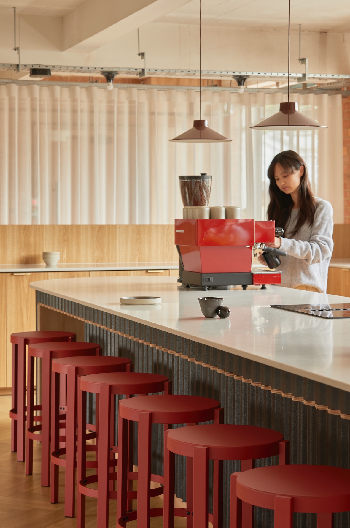 Loom Club kitchen red chairs Islington