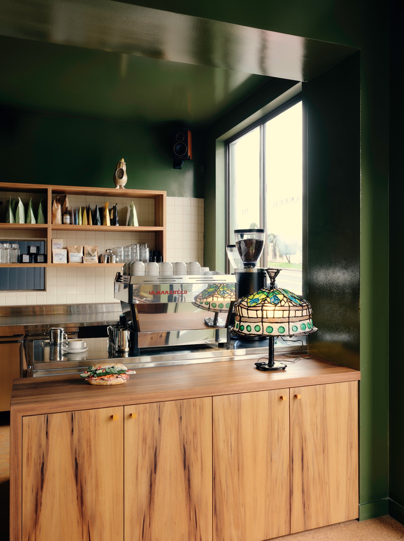 Superfreak green inteiror cafe counter